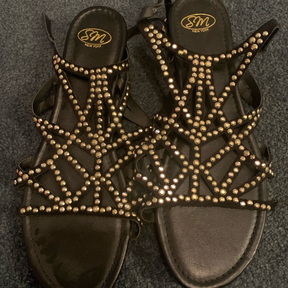 Black and gold sandals
